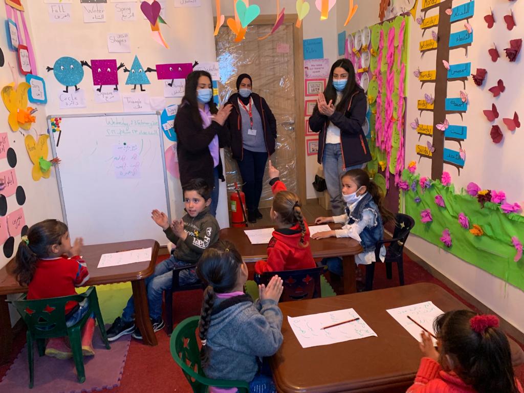 Teachers and students at a learning centre in Bekaa Valley, Lebanon 