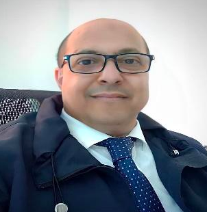photo with a man waring glasses and smiling