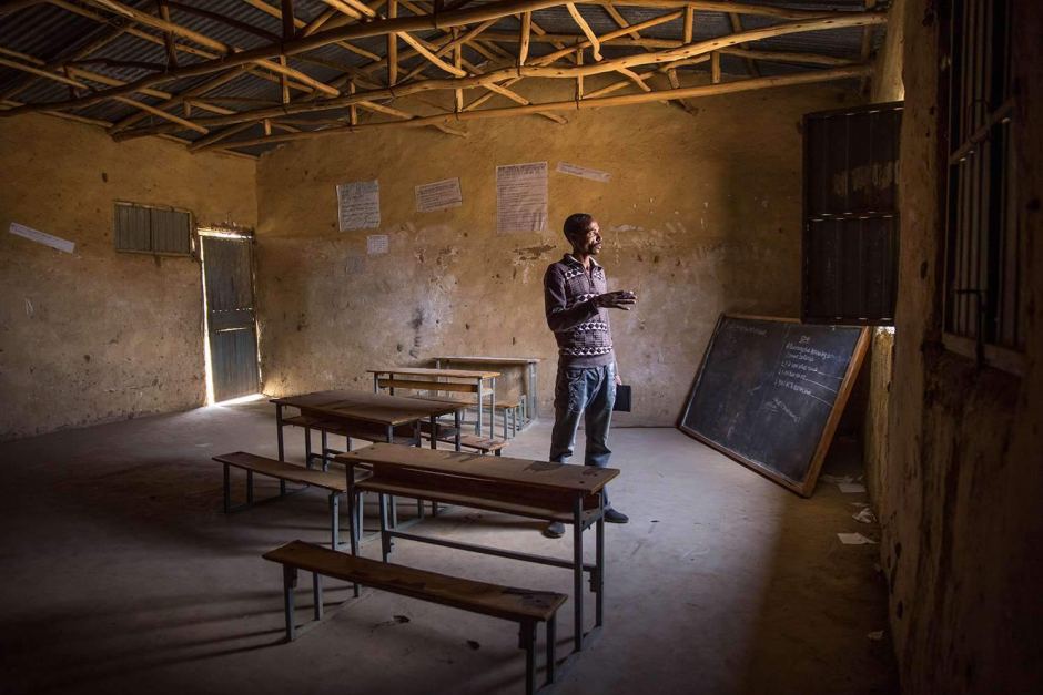 Teacher at empty school in Ethiopia, UNICEF/Ayene