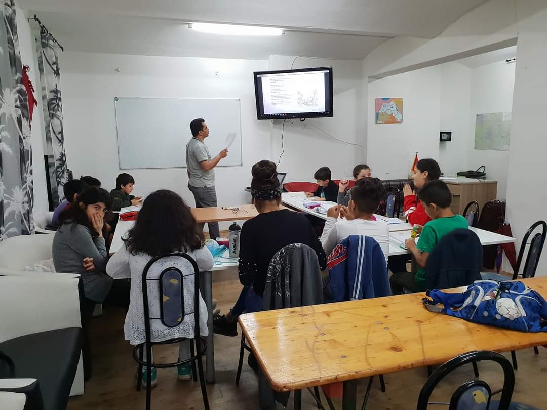 Nazir in class with his students