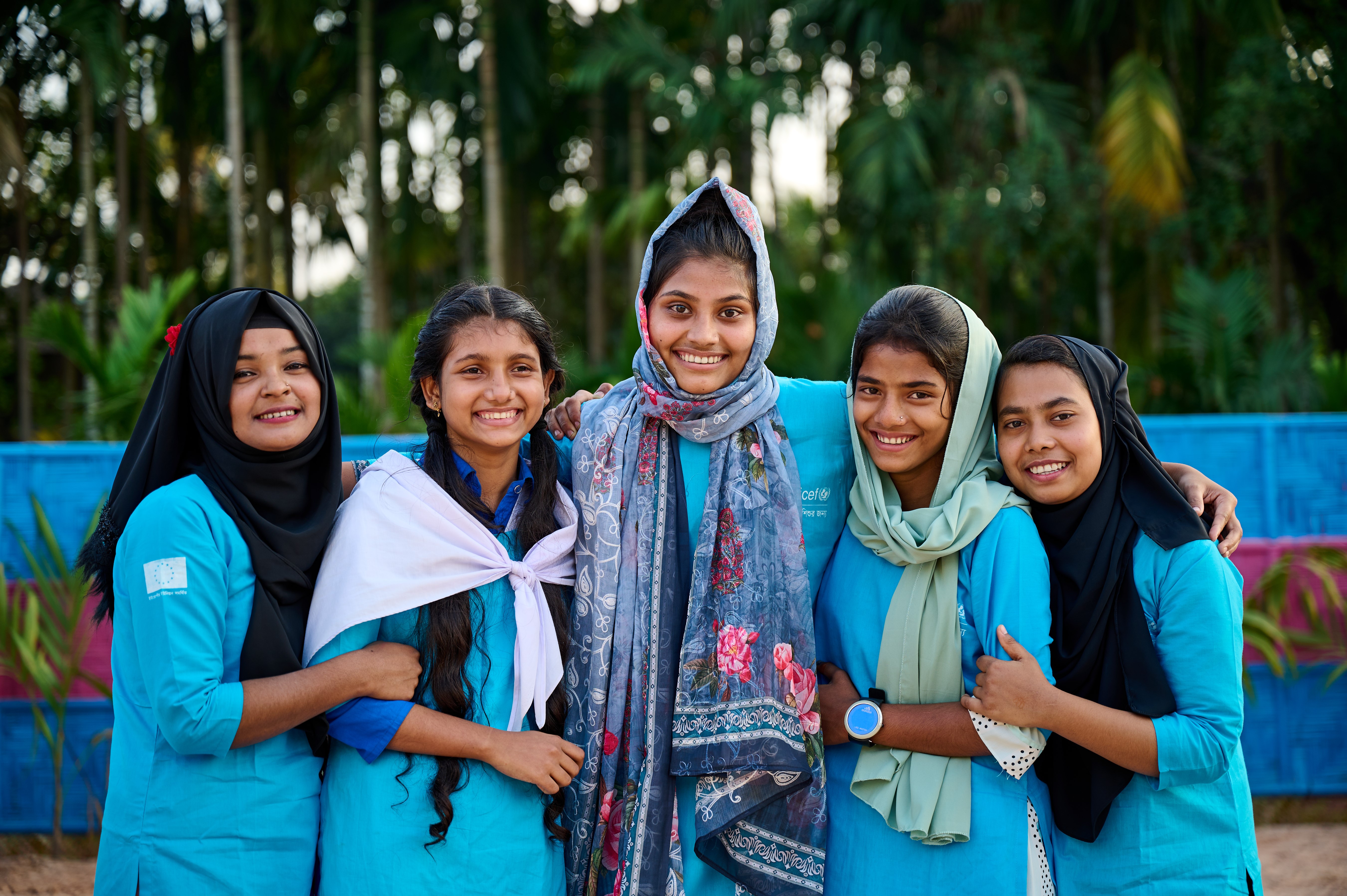 Bangladeshi adolescent girls - Kohinur, Sadia, Sharmin, Sumaiya, and Samila - pose for a picture at the UNICEF Social Hub in Kutupalong West, Cox’s Bazar. Photo taken by Bashir Ahmed Sujan.
