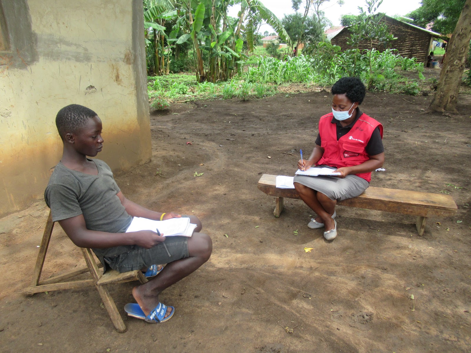  Distributing home learning packs in western Uganda. Credit: Save the Children