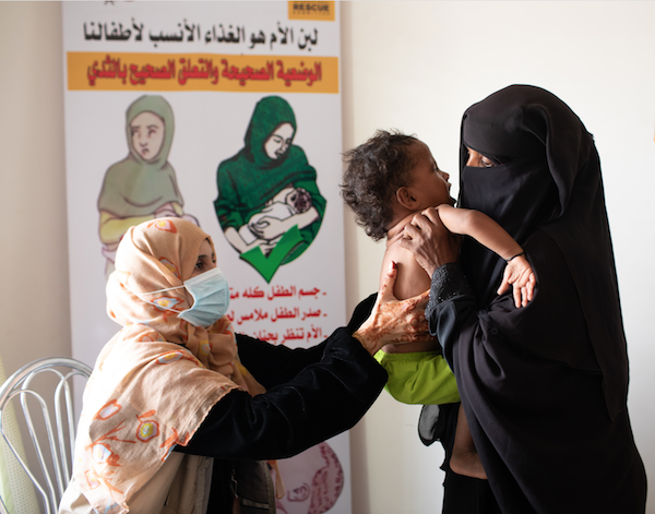 Displaced woman Nadia Mohammed Fadhl with her son Mater receives assistance at an IRC mobile clinic operating in the suburb of Bir Ahmed on the outskirts of Aden, Yemen on Thursday, January 10, 2019. 